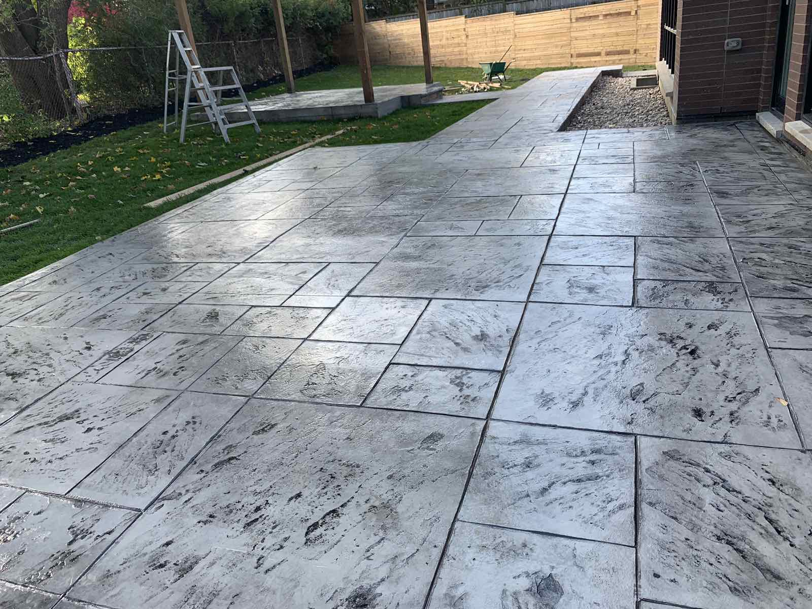 Stamped concrete backyard