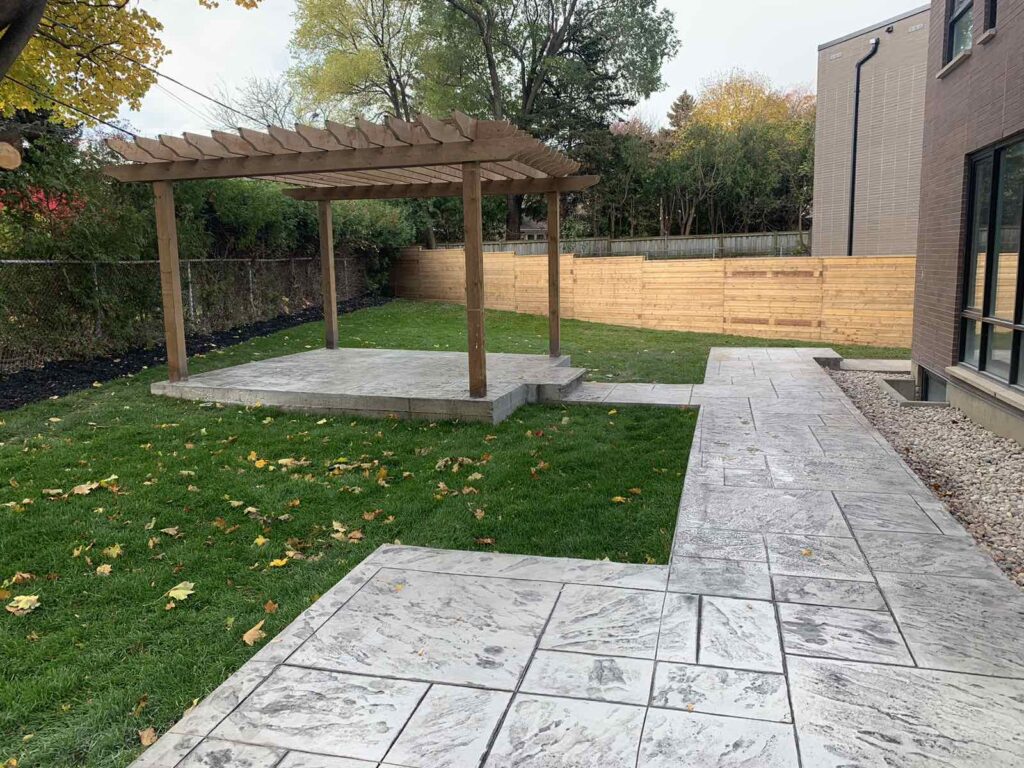 Stamped concrete backyard